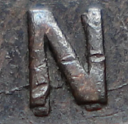 Re-engraved N in OUND