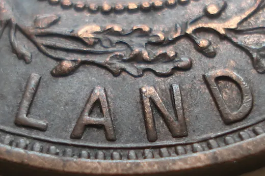 Re-engraved N in LAND