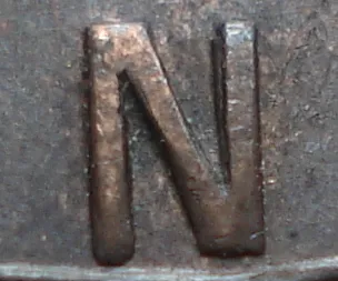 Re-engraved N in LAND