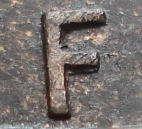 Re-engraved F in NEWF