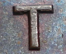 Re-engraved T in CENT